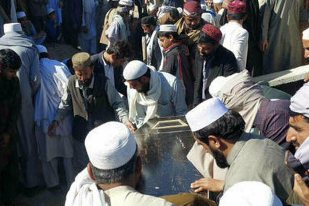 Militants kill and injure dozens in attack on Pakistani military base - media
