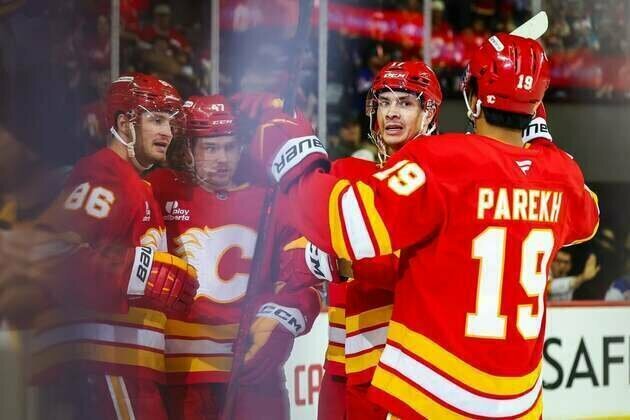 Flames halt 8-game skid with victory over struggling Rangers