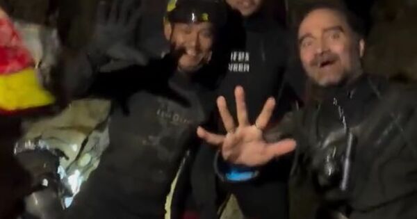 Rescuers find five people trapped in Laos cave, two still missing
