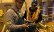 Jordan Stewart, maintenance technician at Cortez, updates a job status on his tablet