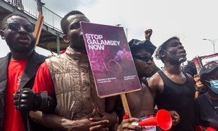  Ghanaians march in protest against illegal gold mining and unlawful arrests on 5 October 2024. Photo: Delali Adogla-Bessa / Shutterstock