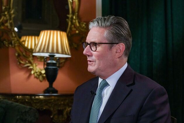 Keir Starmer has his hands up in surrender whenever he walks onto world stage