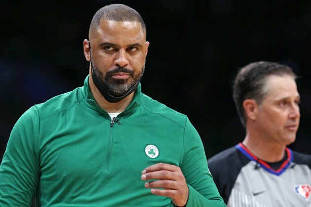 NBA coach banned over improper relations