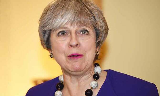 May, Macron meet at UK summit May, Macron meet at UK summit