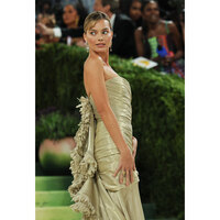 Margot Robbie returns to Met Gala in intricately embroidered gold Chanel gown