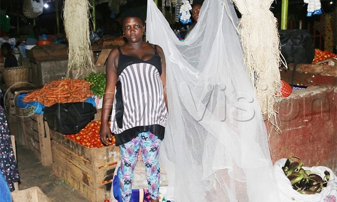 Coronavirus: 9-months pregnant vendor sleeps at Mukono market Coronavirus: 9-months pregnant vendor sleeps at Mukono market