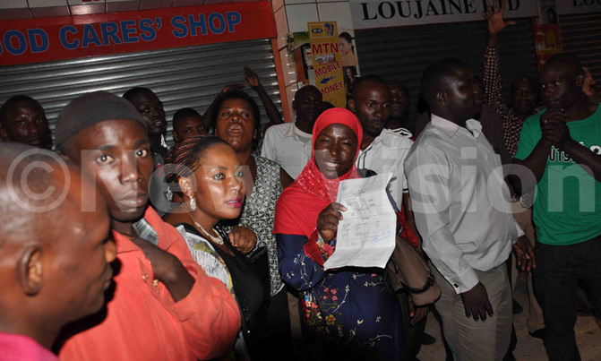Kikuubo cosmetics traders demonstrate against URA operations Kikuubo cosmetics traders demonstrate against URA operations
