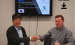 SungEel President Kang Myung Yi and Envirostream MD Andrew Mackenzie shaking hands after signing the offtake MoU.