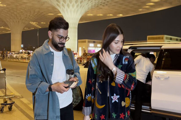 Virat Kohli, Anushka Sharma arrive at Mumbai airport in style, greets paps with smiles