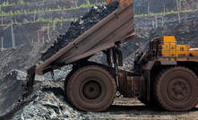 Unloading of mined rock at a transfer point at Mikhailovsky GOK