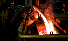 Casting molten copper into a furnace