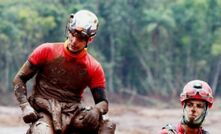 Minas Gerais firefighters take a break during operations at Brumadinho