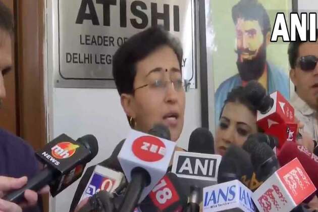 Atishi questions BJP over 'Buy 1 Get 1 Free' liquor offer in UP, asks if CM Yogi approved it.