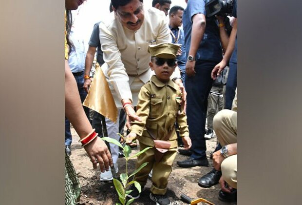 MP CM Mohan Yadav plants sapling with police officials as part of 'Ek Ped Maa Ke Naam' campaign in Bhopal