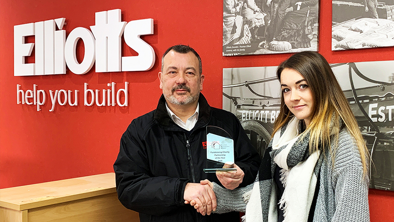 Rachel Rawlings presenting the award to Ed Butcher