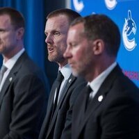 Canucks promote Ryan Johnson to GM, Sedin brothers to co-presidents