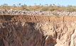 Rare earths are visible at the top of the pit wall, on-site at Browns range. Photo by Karma Barndon