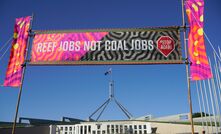 Apparently it is okay for activist groups to run banners outside a parliament, but not a mining company.