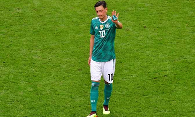 Mesut Ozil - from integration poster boy to racism storm Mesut Ozil - from integration poster boy to racism storm
