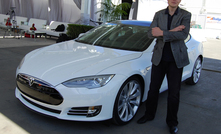  Musk next to a Tesla Model S, 2011