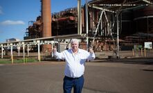 Clive Palmer outside the Queensland Nickel refinery.