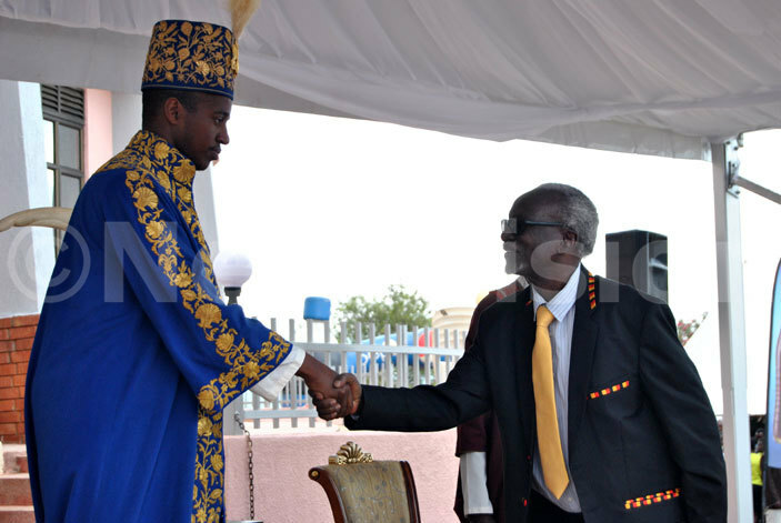 king yo welcoming the minister of ast frican affairs irunda ivejinja 