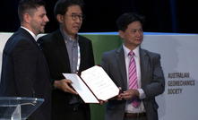  Eddie Tan (centre) Seequent's sales and channel director Asia receives the Outstanding Innovation Award winner at the 20th International Conference on Soil Mechanics and Geotechnical Engineering on behalf of the PLAXIS team