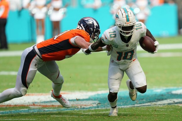 NFL roundup: Dolphins score 70 points in routing Broncos