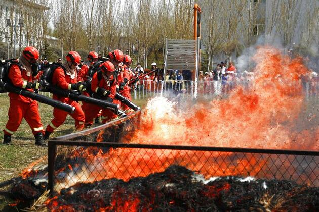 InPics | China boosts disaster awareness through publicity and training