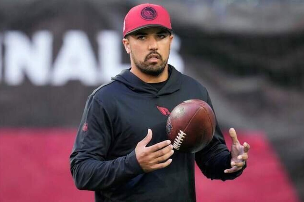 Cowboys to hire Ryan Smith from Cardinals for Parker's staff