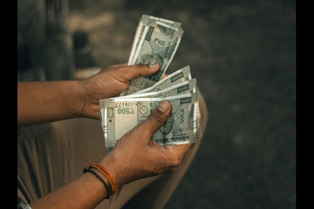 Equity outflows and trade uncertainty leave rupee trailing Asian peers