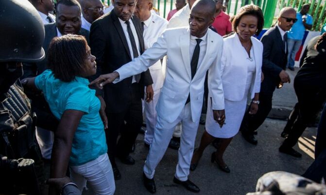 Thousands protest corruption in Haiti, president gets shoved Thousands protest corruption in Haiti, president gets shoved