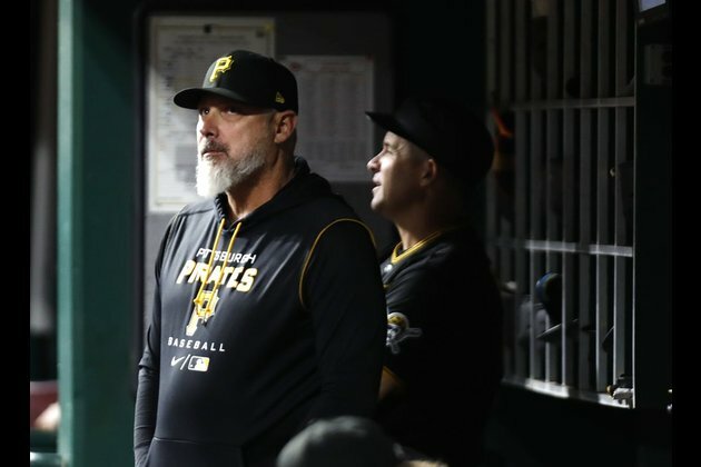 Pirates complete sweep of Reds with 10-inning win