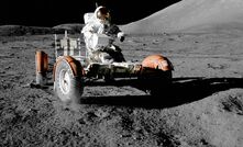 Astronaut Eugene Cernan at the controls of Apollo 17's lunar rover.