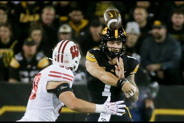Kaleb Johnson runs for 3 TDs as Iowa rolls past Wisconsin