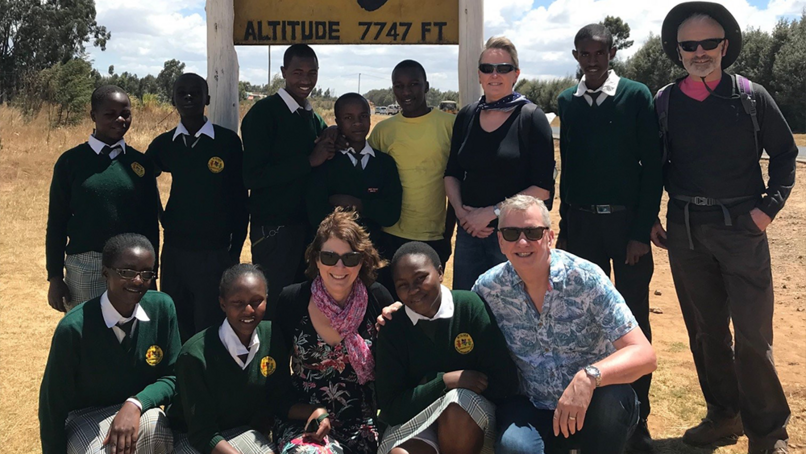 John Newcomb, front row, with his wife Sue, and the pupils and supporters at Kisima School in Kenya.