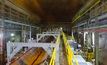 Suspending conveyors maximises the space available in narrow drifts underground. Photo: Tenova TAKRAF