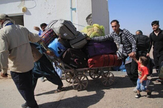 Afghan Migrants In Iran Face Growing Hardship Amid War Fallout