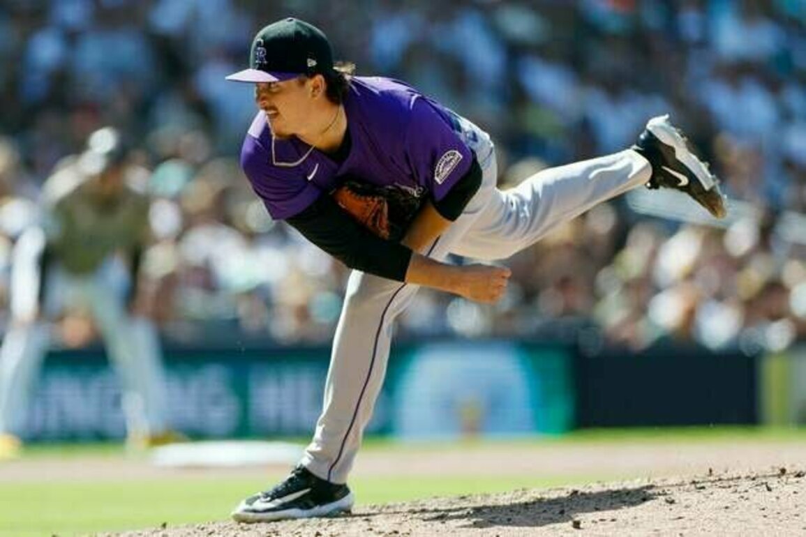 Rockies place RHP Victor Vodnik on IL, select RHP Zach Agnos