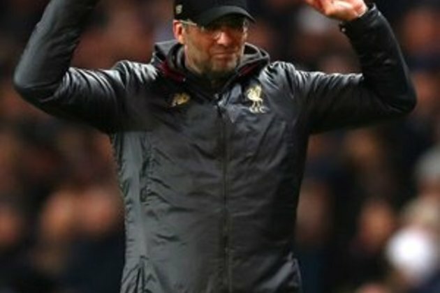 Liverpool down Chelsea to extend perfect start