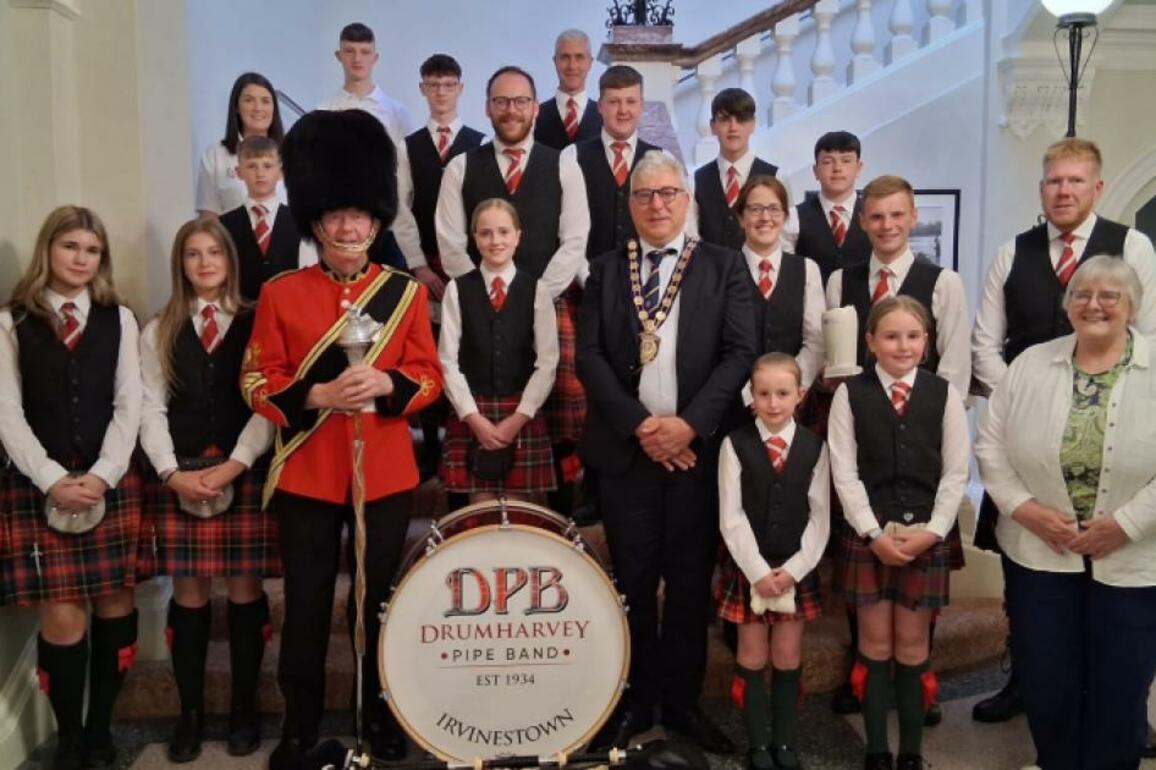 Pipe band honoured for 90 years of music and community