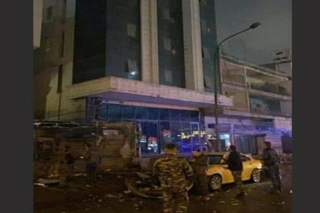 Two Iraqis wounded in blasts that targeted two banks in Baghdad