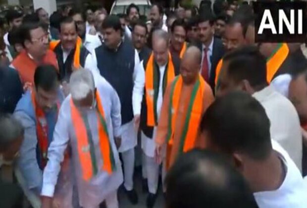 UP CM Yogi Adityanath celebrates outside BJP office after assembly bypoll results