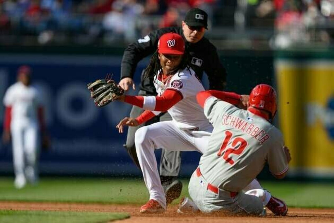 Late heroics lead Phillies past Nationals in extras