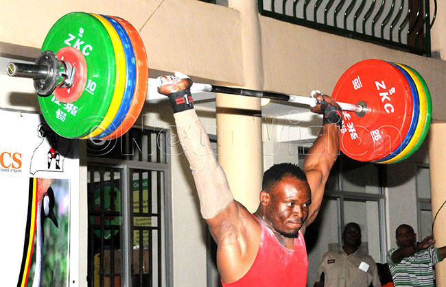  eightlifter ubair ubo from isugu nified club  lifting weights in the clean and jerk style during the pen onanza at isugu