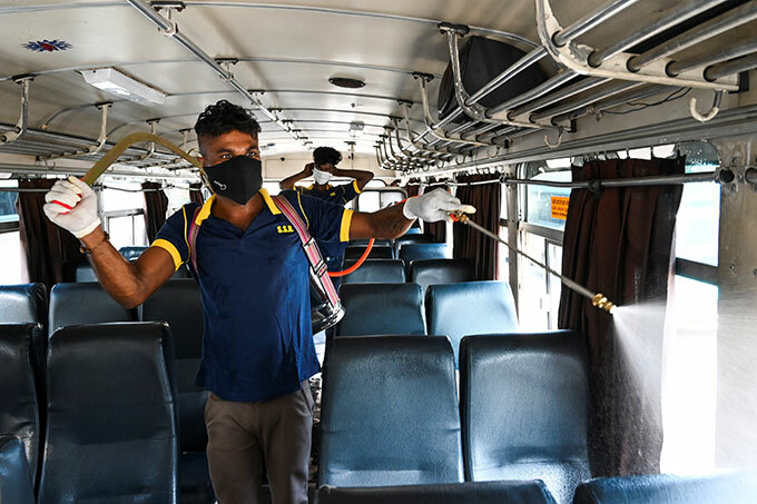  worker sprays disinfectant to sanitize a public bus as a preventive measure against the 19 coronavirus at a bus station in olombo on arch 16 2020 hoto  