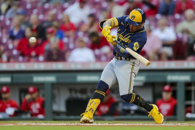Kolten Wong has 3 homers, 5 RBIs as Brewers beat Reds