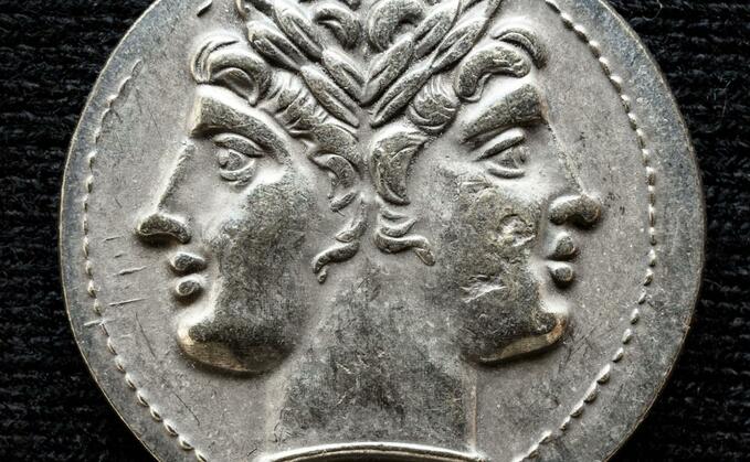 An ancient Roman coin depicting the two-faced god Janus. Source: Shutterstock/Viacheslav Lopatin