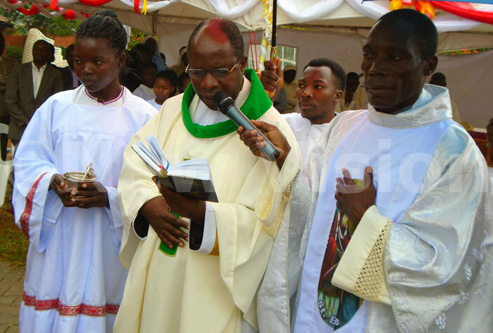  onsignor jumba second left dedicates the students academic items during the mass