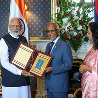 PM Modi hands over OCI Cards to Mauritius President, First Lady
